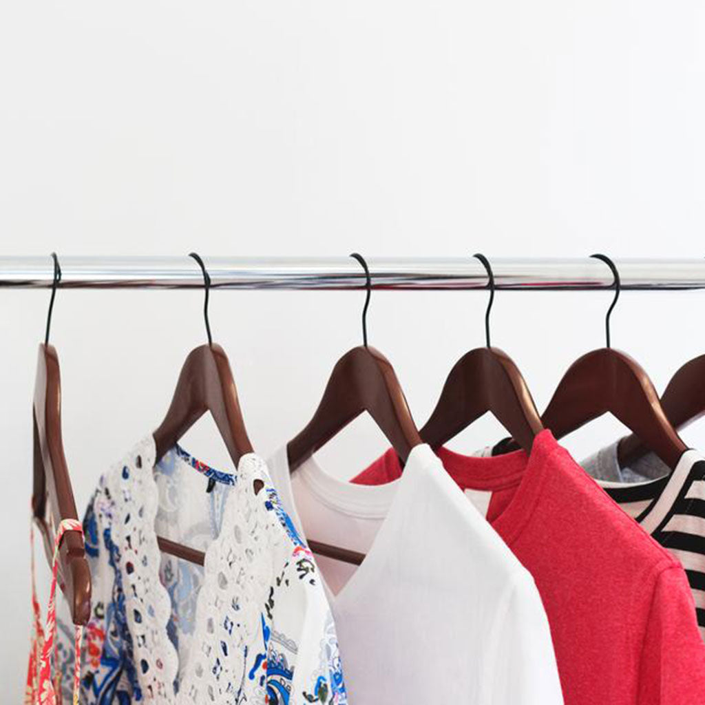 Clothing on a rack // Photo credit by Sarah Pflug from Burst