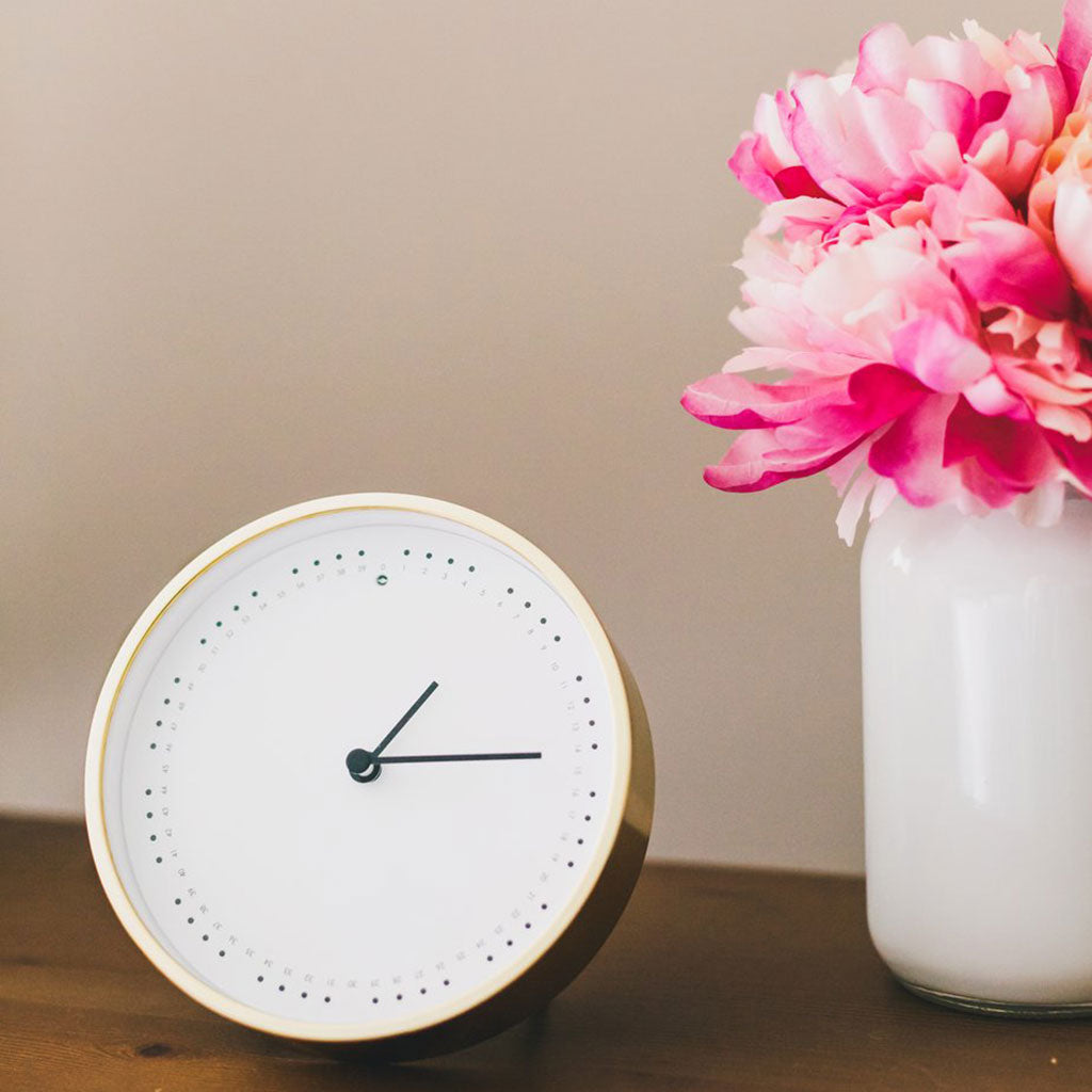 Image of Clock and Flowers to depict job costing // Photo by Sarah Pflug from Burst