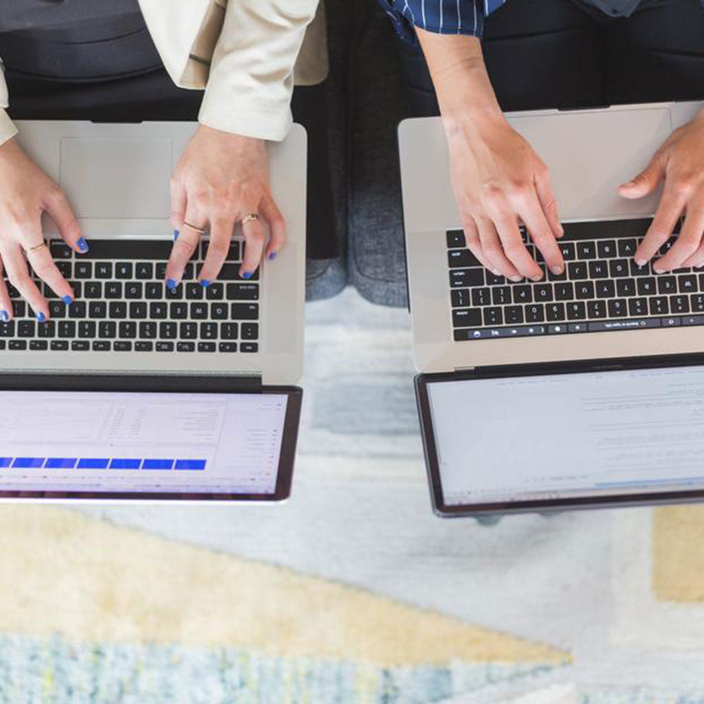 Hands on laptop software support / Photo by Matthew Henry from Burst