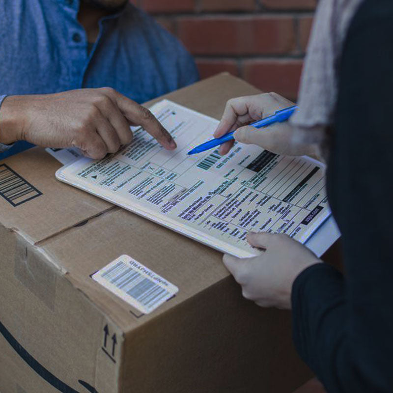 Signing For Box / Logistics //Photo by: Matthew Henry